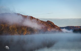 Wisconsin River bluff shrouded by fog on autumn morning (c) Timothy Jacobson
